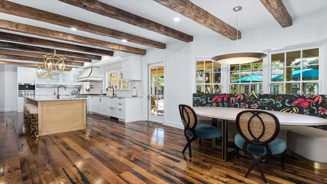 a very nice looking kitchen with a large window