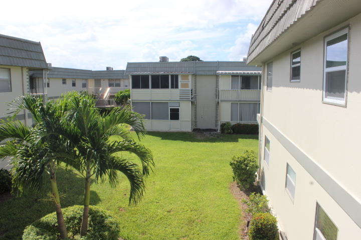 a view of a back yard of the house