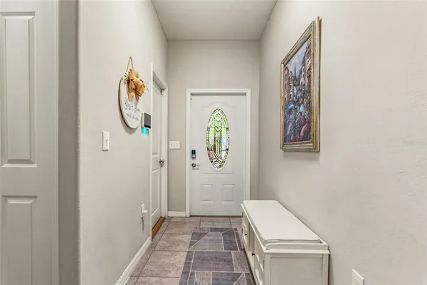 a view of a hallway with entryway