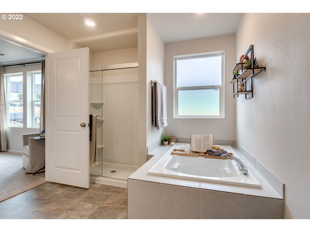 3122 Southeast 34th Way Gresham, OR 97080 - Photo 23 of 26 a bathroom with a sink and a mirror