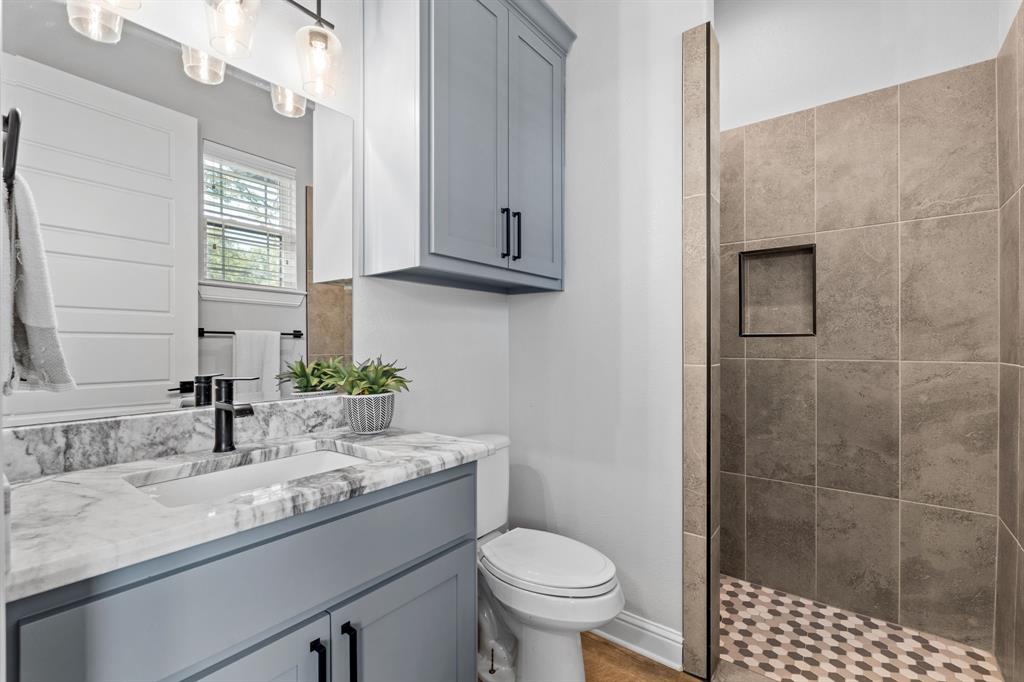 Tbd Tbd Anchor Point Quinlan, TX 75474 - Photo 25 of 40 a bathroom with a sink toilet and shower