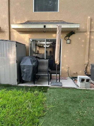 a utility room with two washing machine