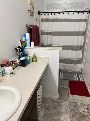 an empty room with wooden floor