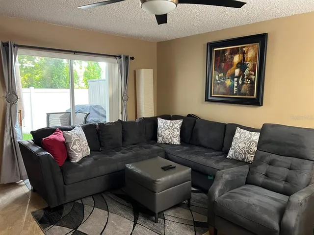 a living room with furniture and a couch