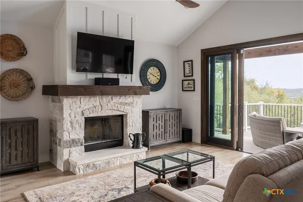 a living room with furniture or couch and a dining table