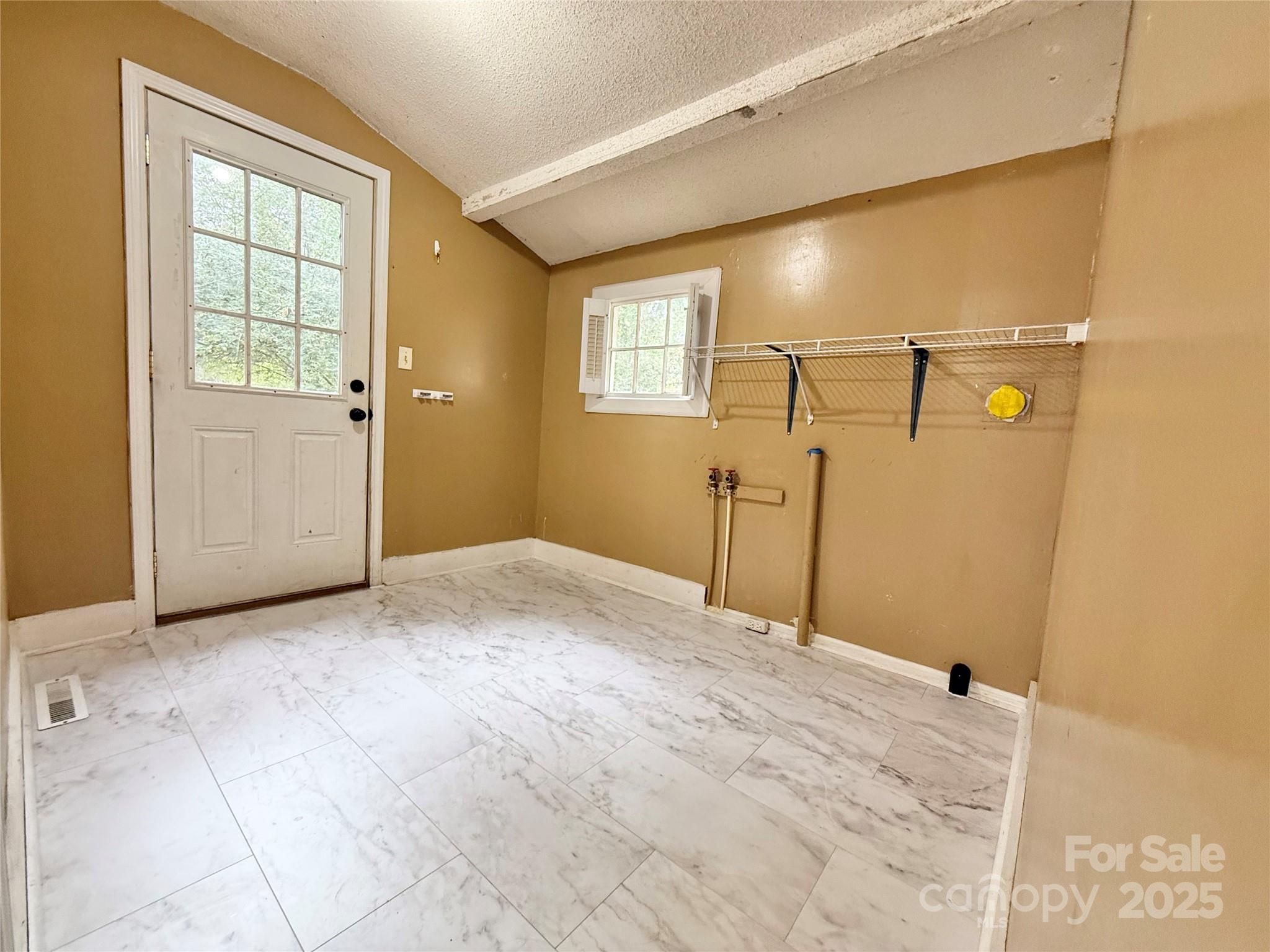 117 Pine Street Chester, SC 29706 - Photo 15 of 19 a view of a big room with closet and windows