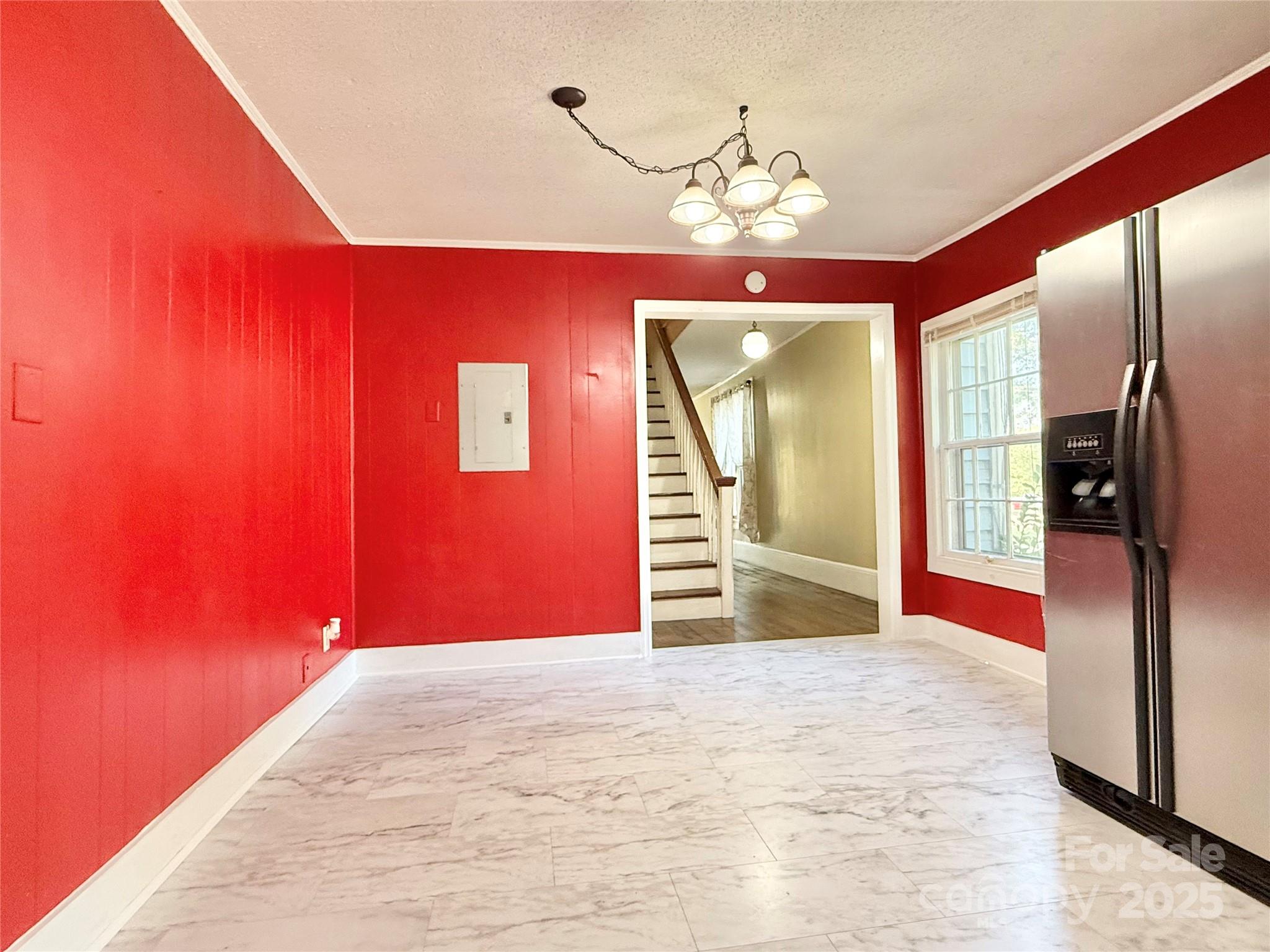 117 Pine Street Chester, SC 29706 - Photo 4 of 19 a view of a livingroom with a staircase