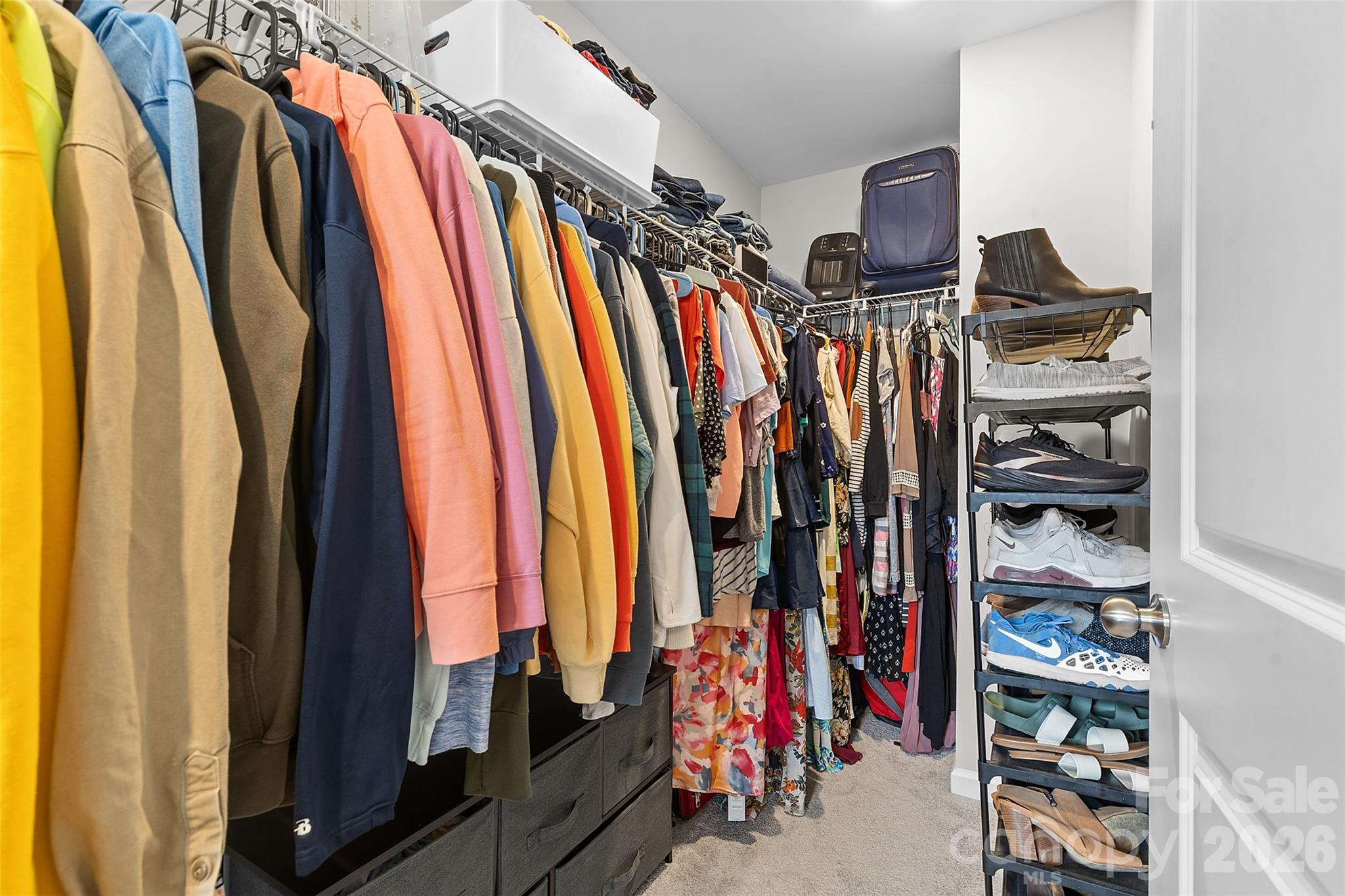 209 Shay Xing Road Salisbury, NC 28146 - Photo 12 of 20 a view of walk in closet with clothes and shoes