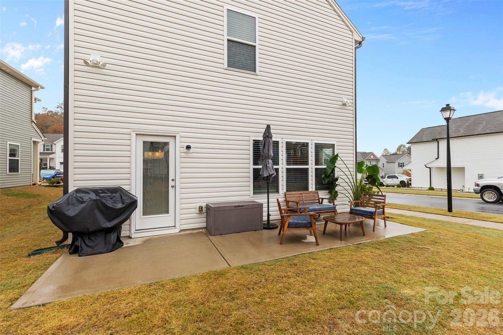 209 Shay Xing Road Salisbury, NC 28146 - Photo 18 of 20 a view of a house with backyard and sitting area