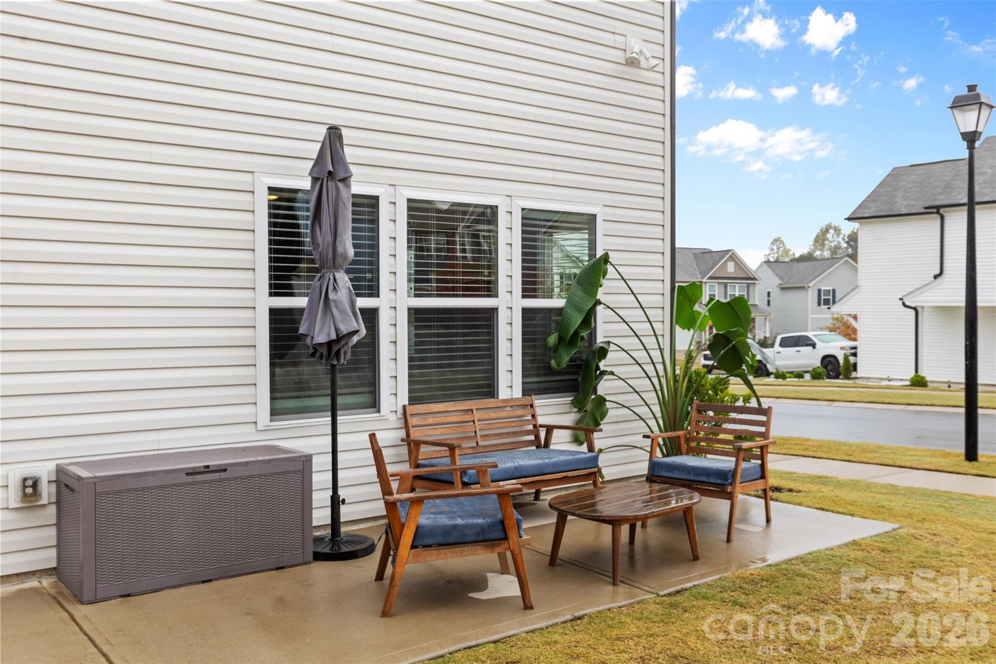 209 Shay Xing Road Salisbury, NC 28146 - Photo 19 of 20 a view of a patio with couches chairs and potted plants