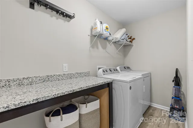 a bathroom with a sink and vanity