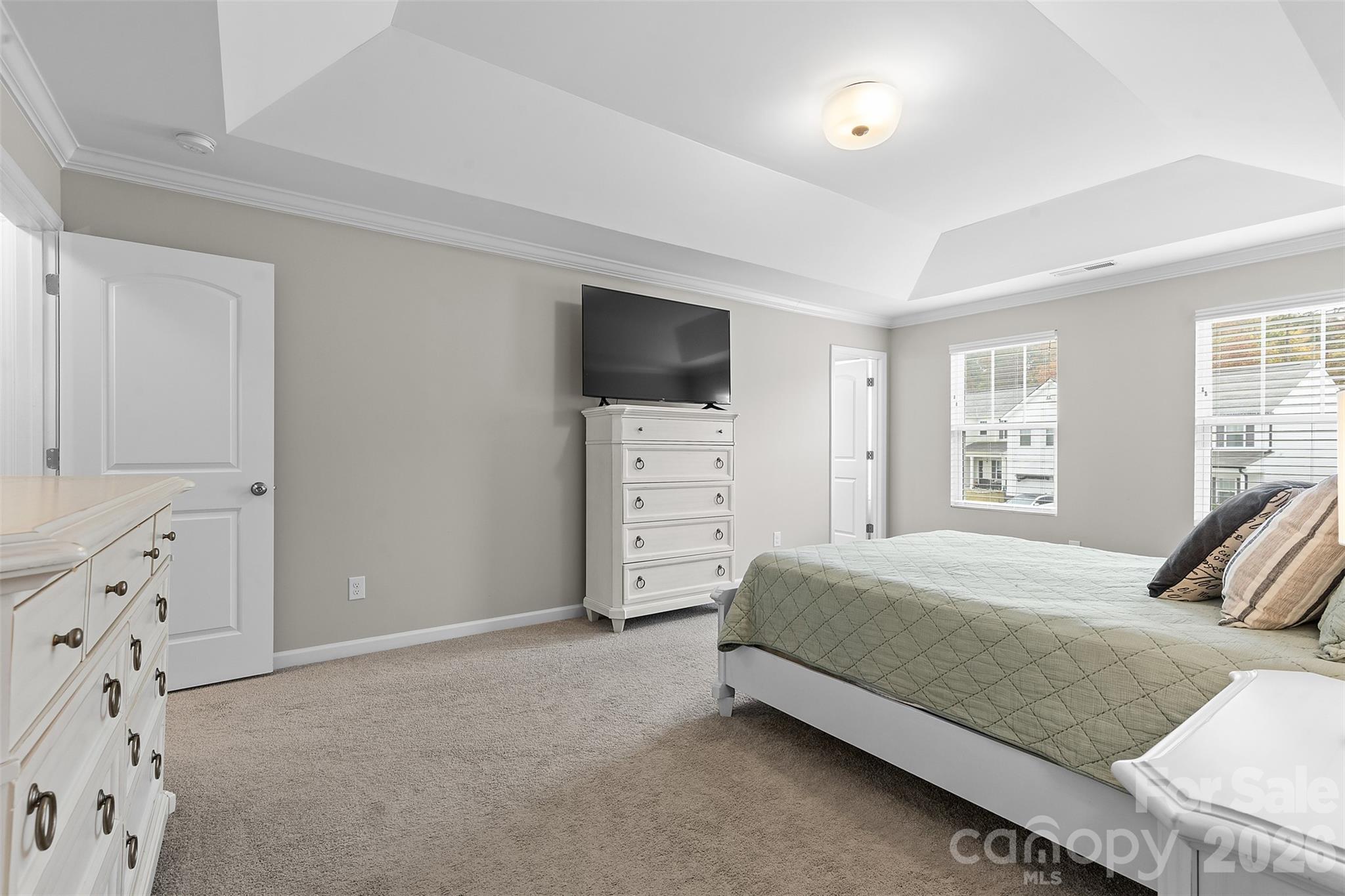 209 Shay Xing Road Salisbury, NC 28146 - Photo 10 of 20 a bedroom with a bed and a flat screen tv
