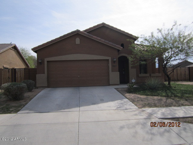 941 West Carter Road Phoenix, AZ 85041 - Photo 1 of 10 a front view of house with garage