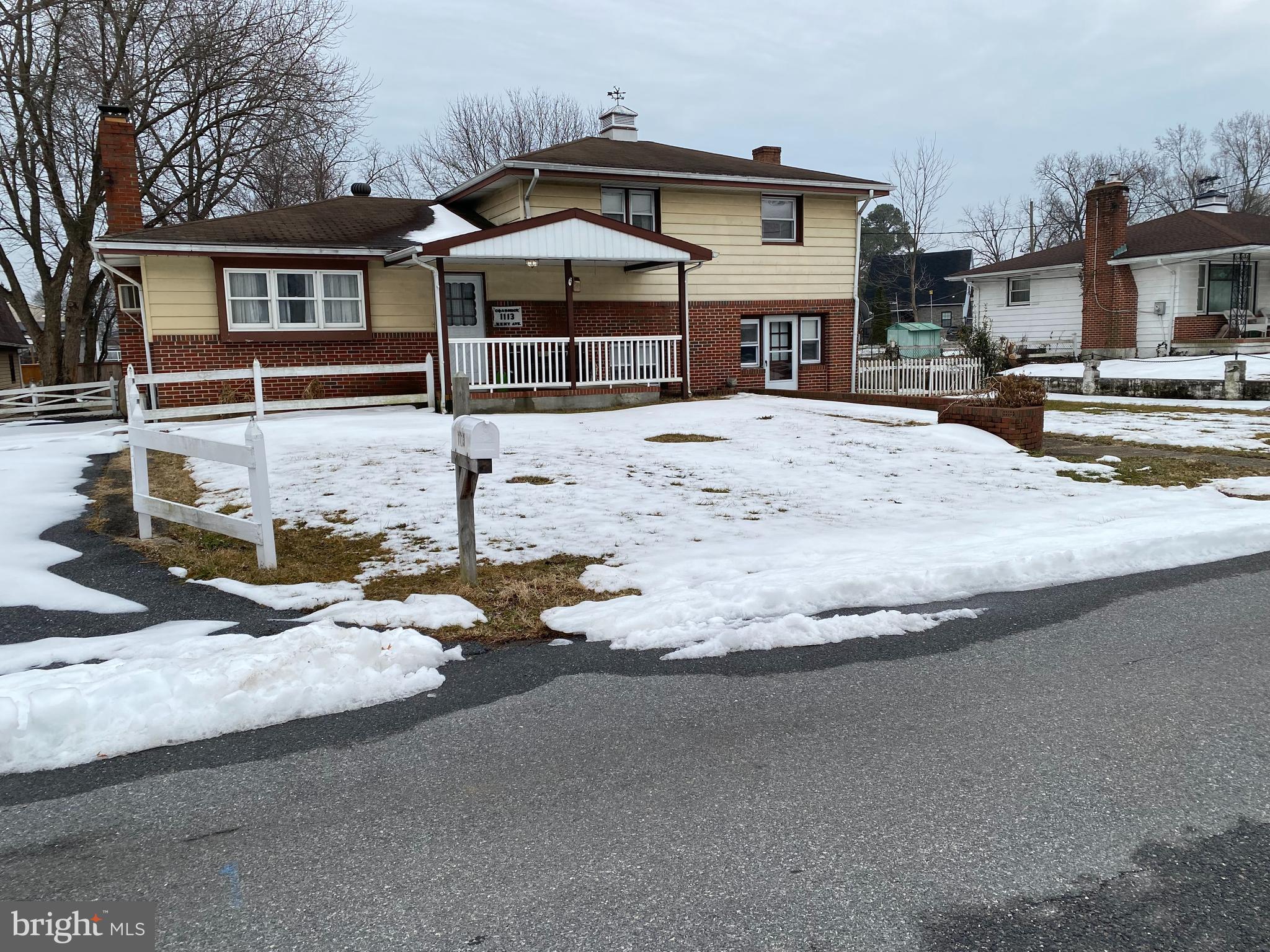 1113 Kent Avenue Baltimore, MD 21207 - Photo 3 of 4 a front view of a house with entertaining space