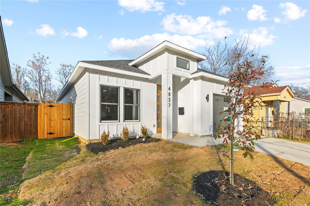 4827 Baldwin Street Dallas, TX 75210 - Photo 21 of 21 a front view of a house with a yard