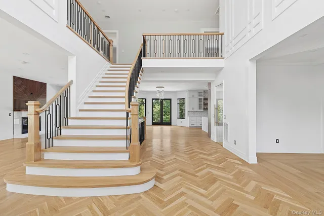 a view of staircase with white walls