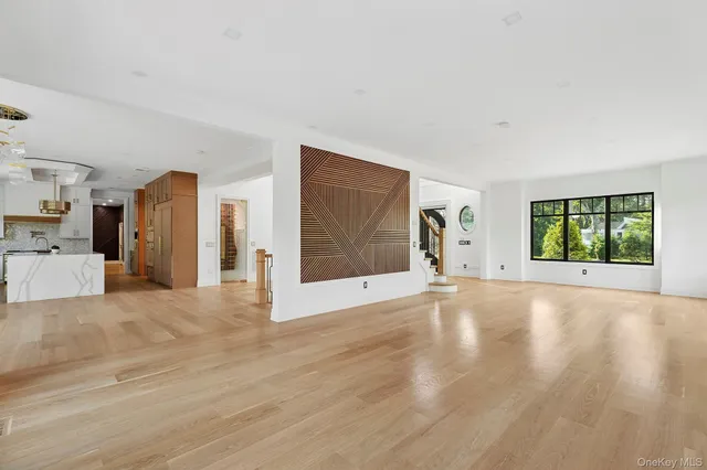 a view of a livingroom with a staircase
