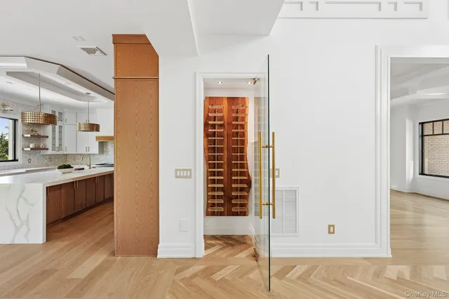 a view of a bathroom with a tub and shower