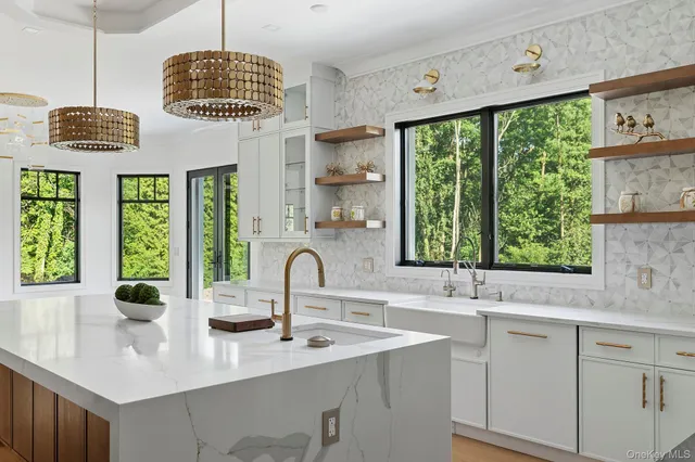 a kitchen with a window and sink