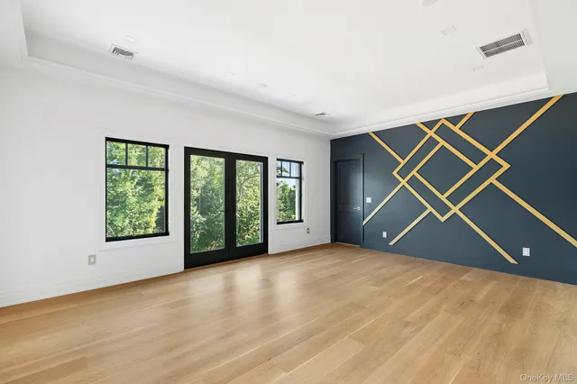 an empty room with windows