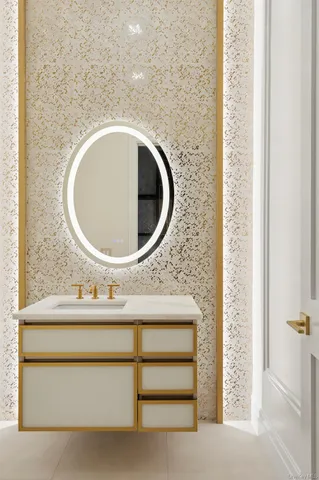 a bathroom with a sink and a mirror