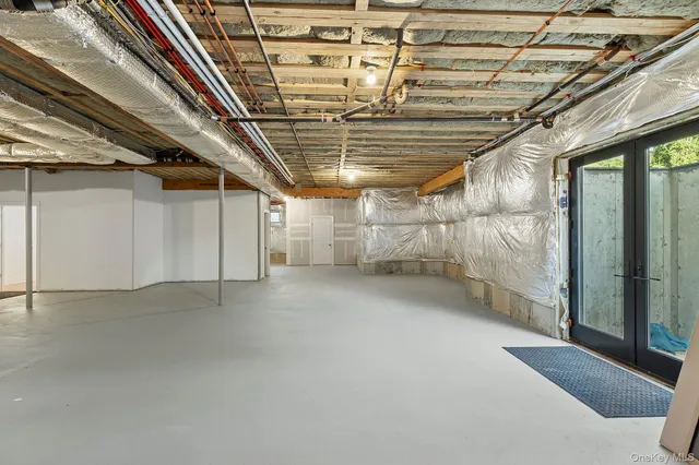 a view of living room filled with furniture and window