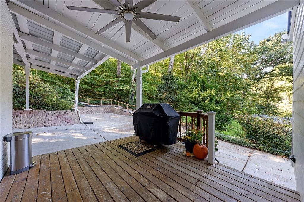 2632 Defoors Ferry Road Northwest Atlanta, GA 30318 - Photo 18 of 22 a view of a patio with wooden floor of a house