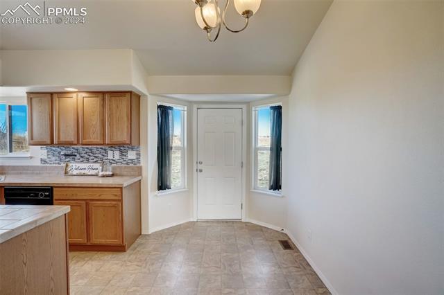 11649 Rio Secco Road Peyton, CO 80831 - Photo 13 of 42 Kitchen with eat in dining area
