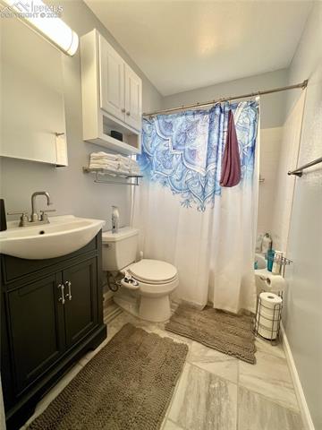 700 Rye Ridge Road Fountain, CO 80817 - Photo 13 of 27 main level full bathroom
