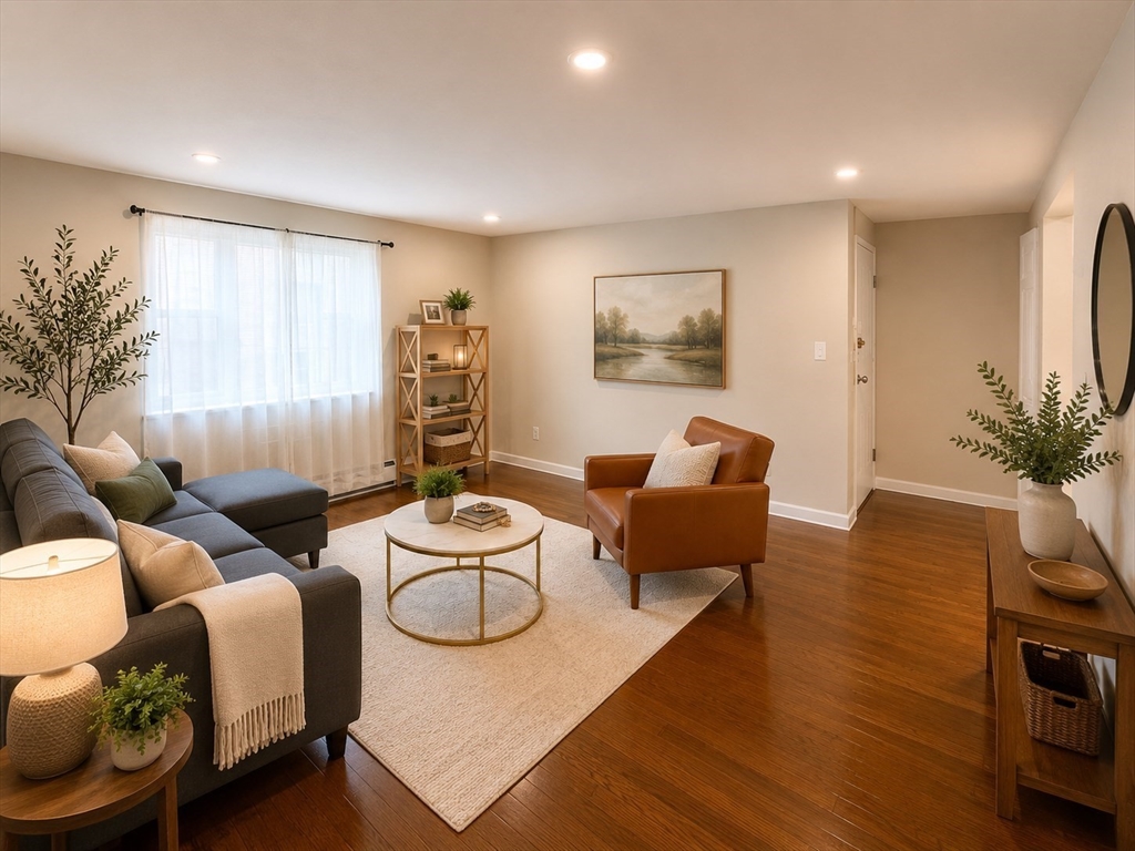 43 Colborne Road, Unit 4 Boston, MA 02135 - Photo 2 of 11 a living room with furniture and wooden floor