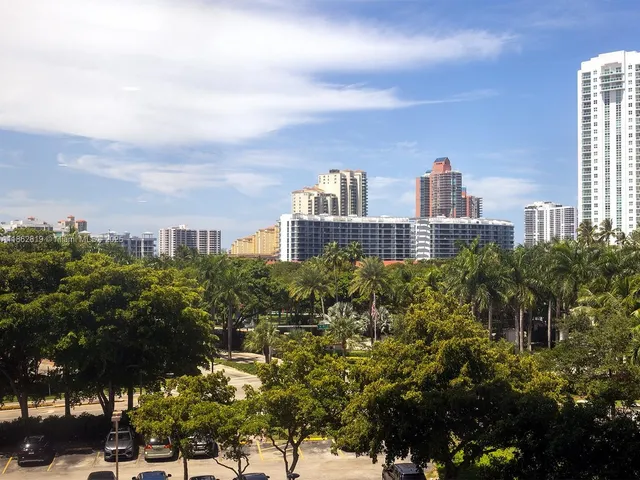 a view of a city with tall buildings