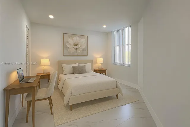 a bedroom with a bed and a chair