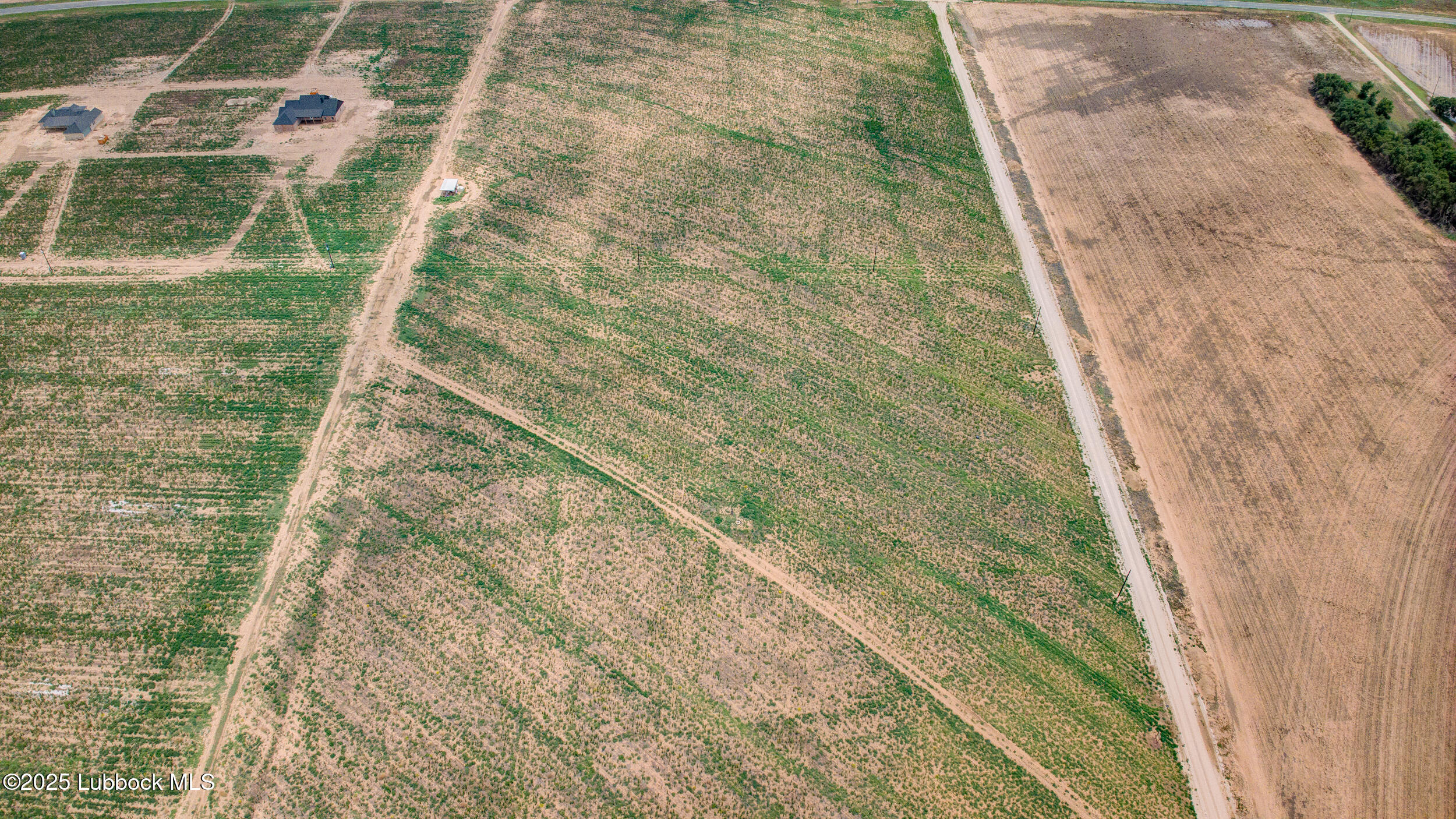 27 Woodrow Slaton, TX 79364 - Photo 7 of 12 DJI_20250611151031_0036_D_37_D_38_D_39_D
