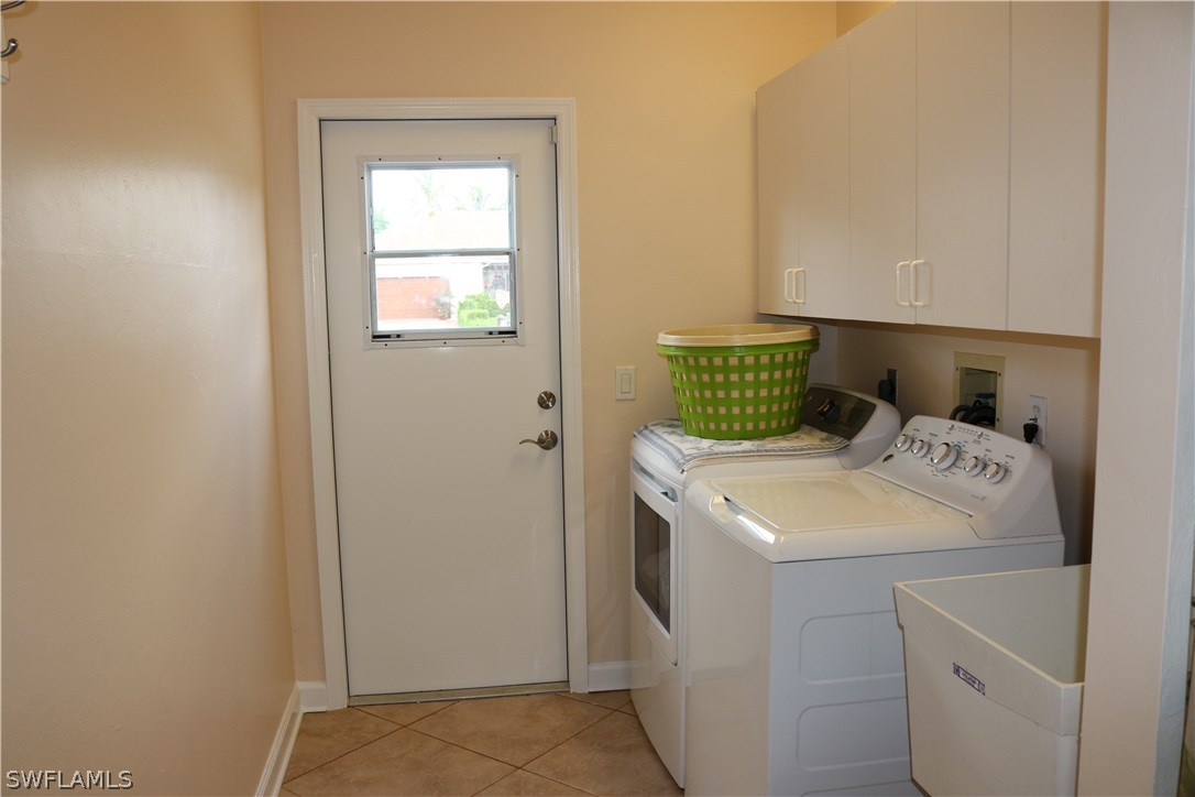 18432 Olive Road Fort Myers, FL 33967 - Photo 13 of 18 a utility room with dryer and washer