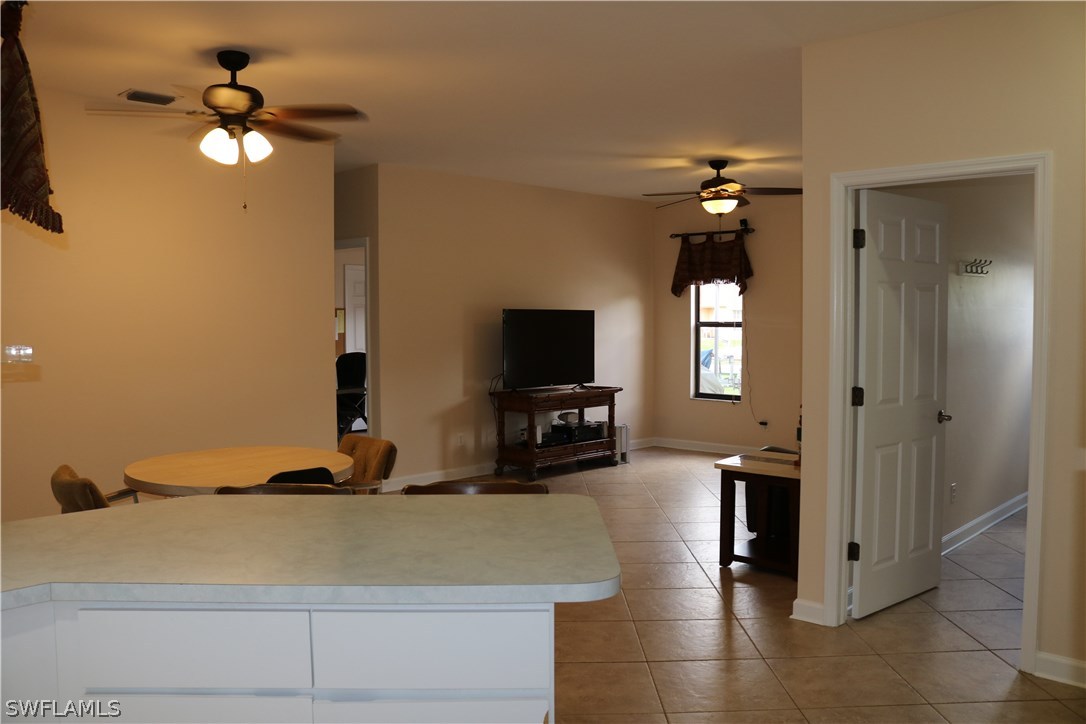 18432 Olive Road Fort Myers, FL 33967 - Photo 8 of 18 a view of a livingroom with a flat screen tv