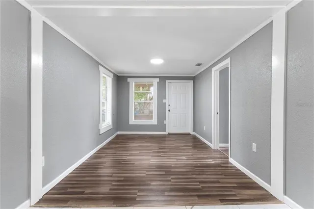 a view of an empty room and window