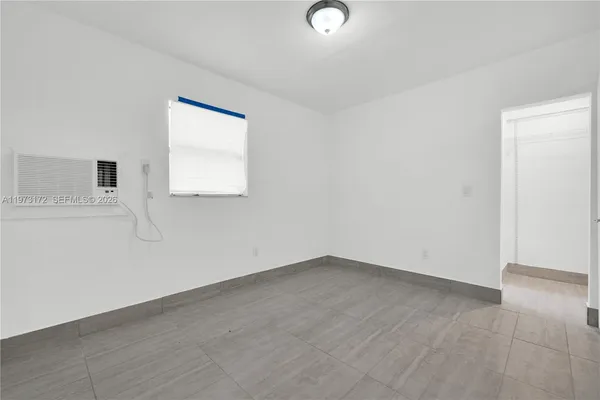 an empty room with a window