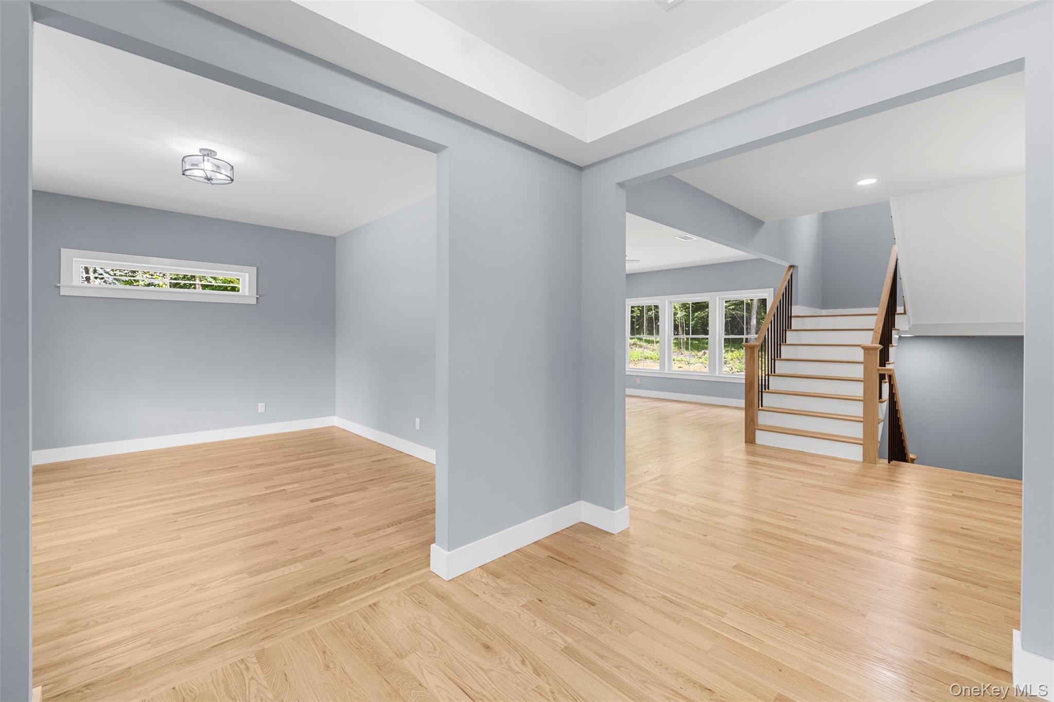 264 Lybolt Road Middletown, NY 10941 - Photo 14 of 45 a view of empty room with wooden floor