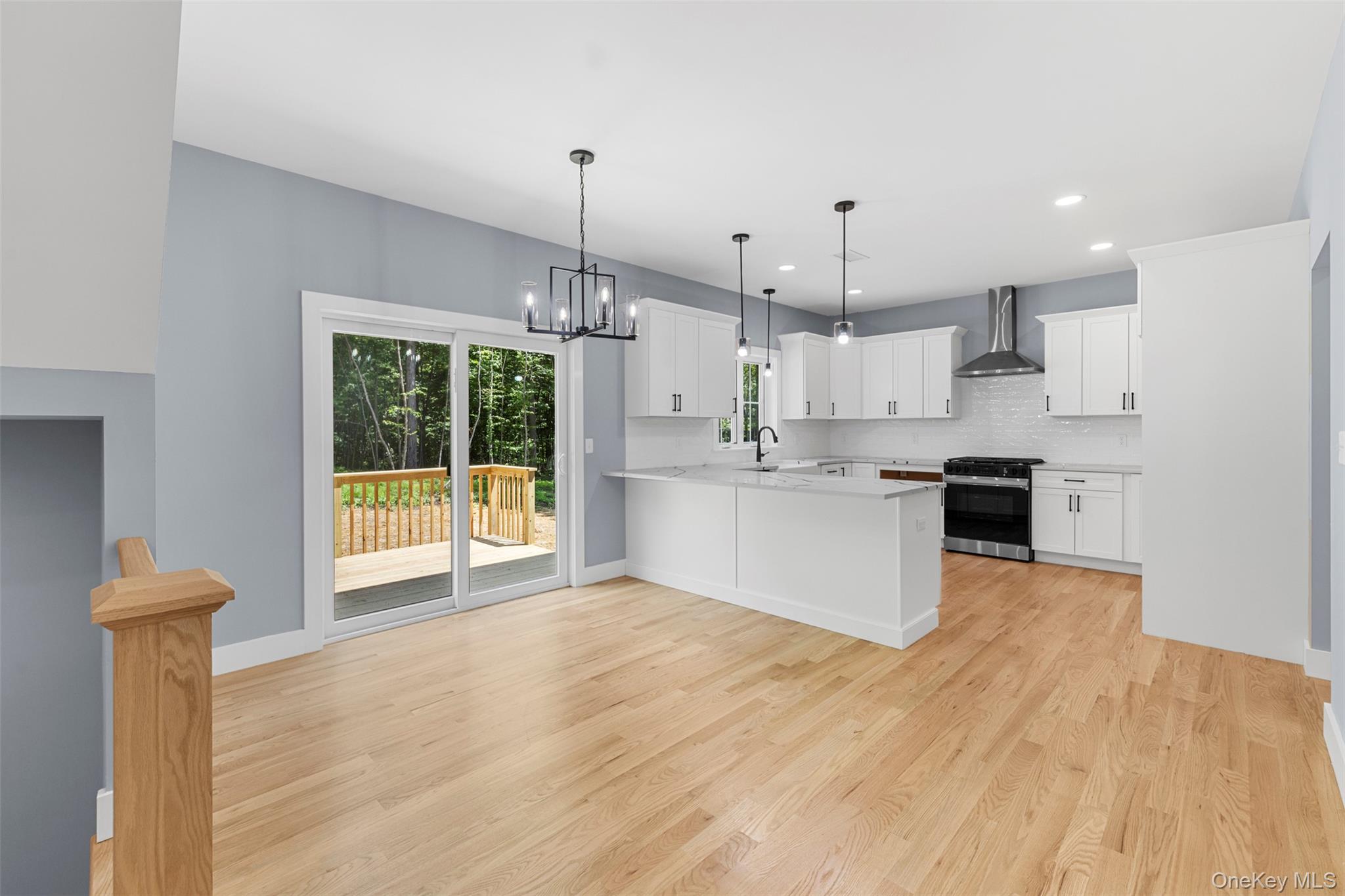 264 Lybolt Road Middletown, NY 10941 - Photo 21 of 45 a view of a kitchen with stainless steel appliances wooden floor and a window