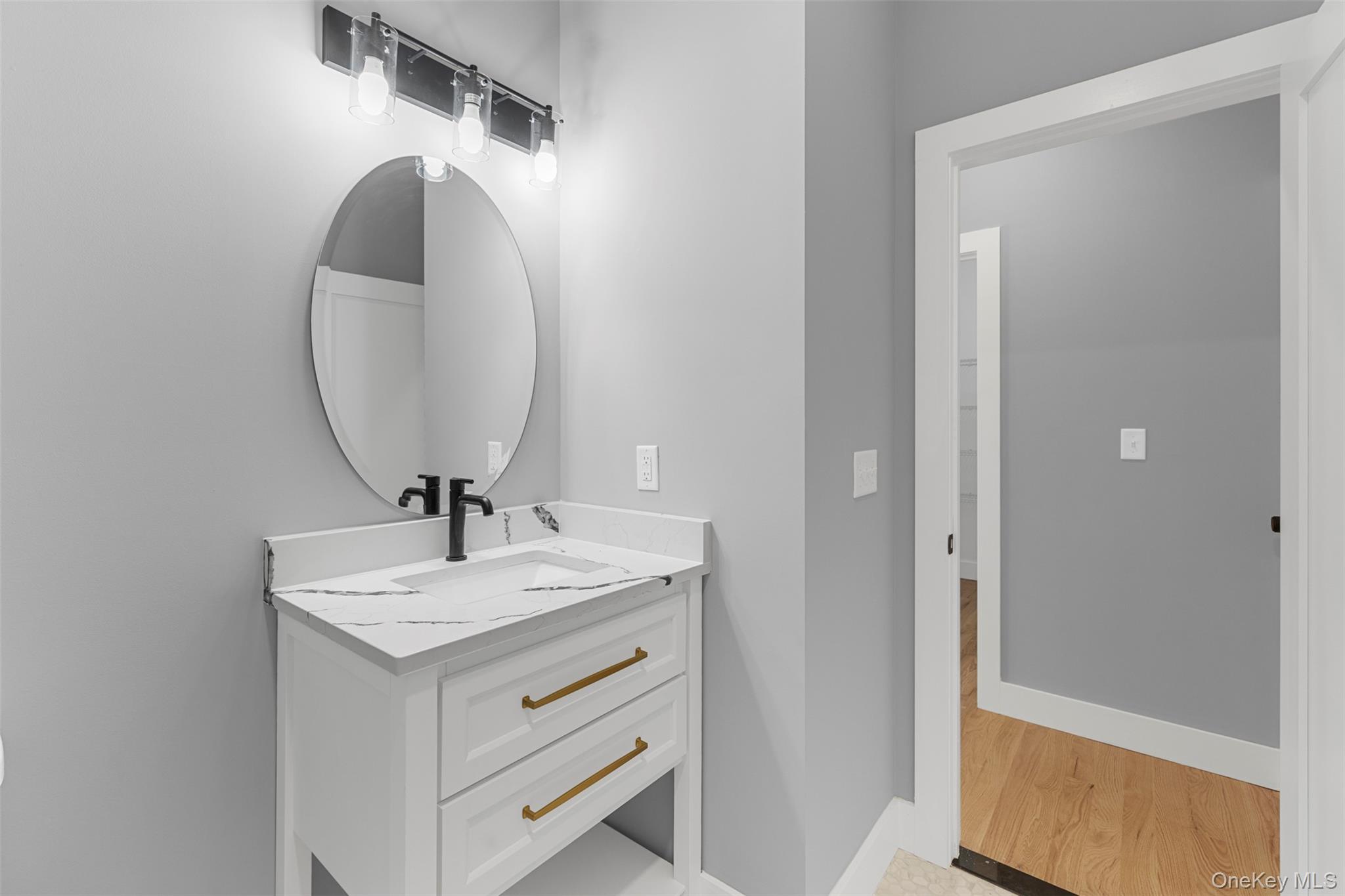 264 Lybolt Road Middletown, NY 10941 - Photo 40 of 45 a bathroom with a sink and a mirror