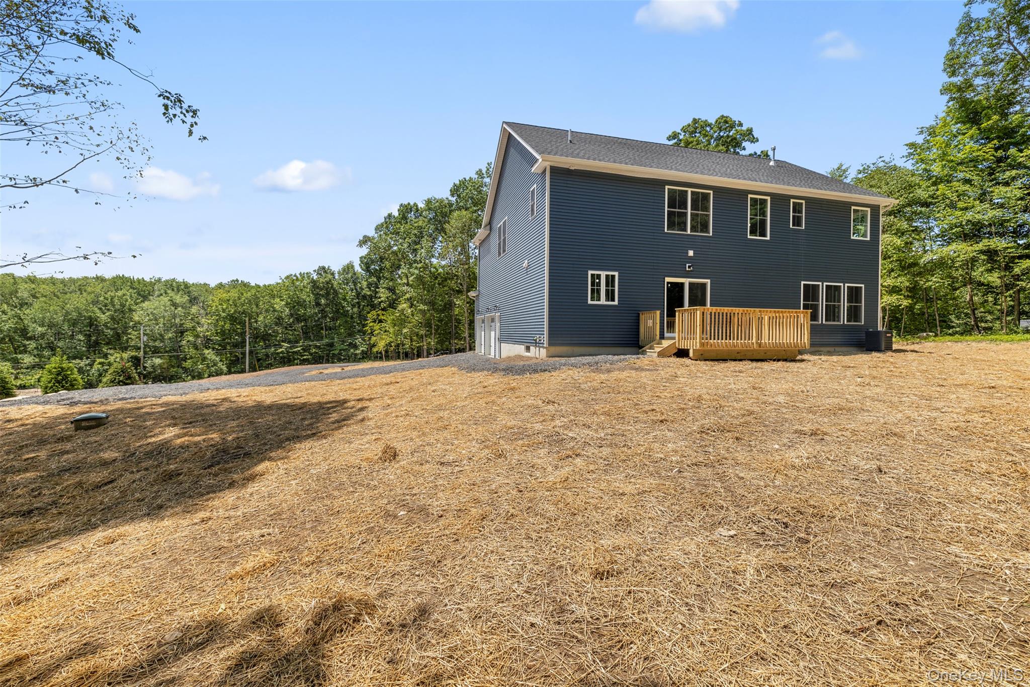 264 Lybolt Road Middletown, NY 10941 - Photo 4 of 45 a front view of a house with yard and garage