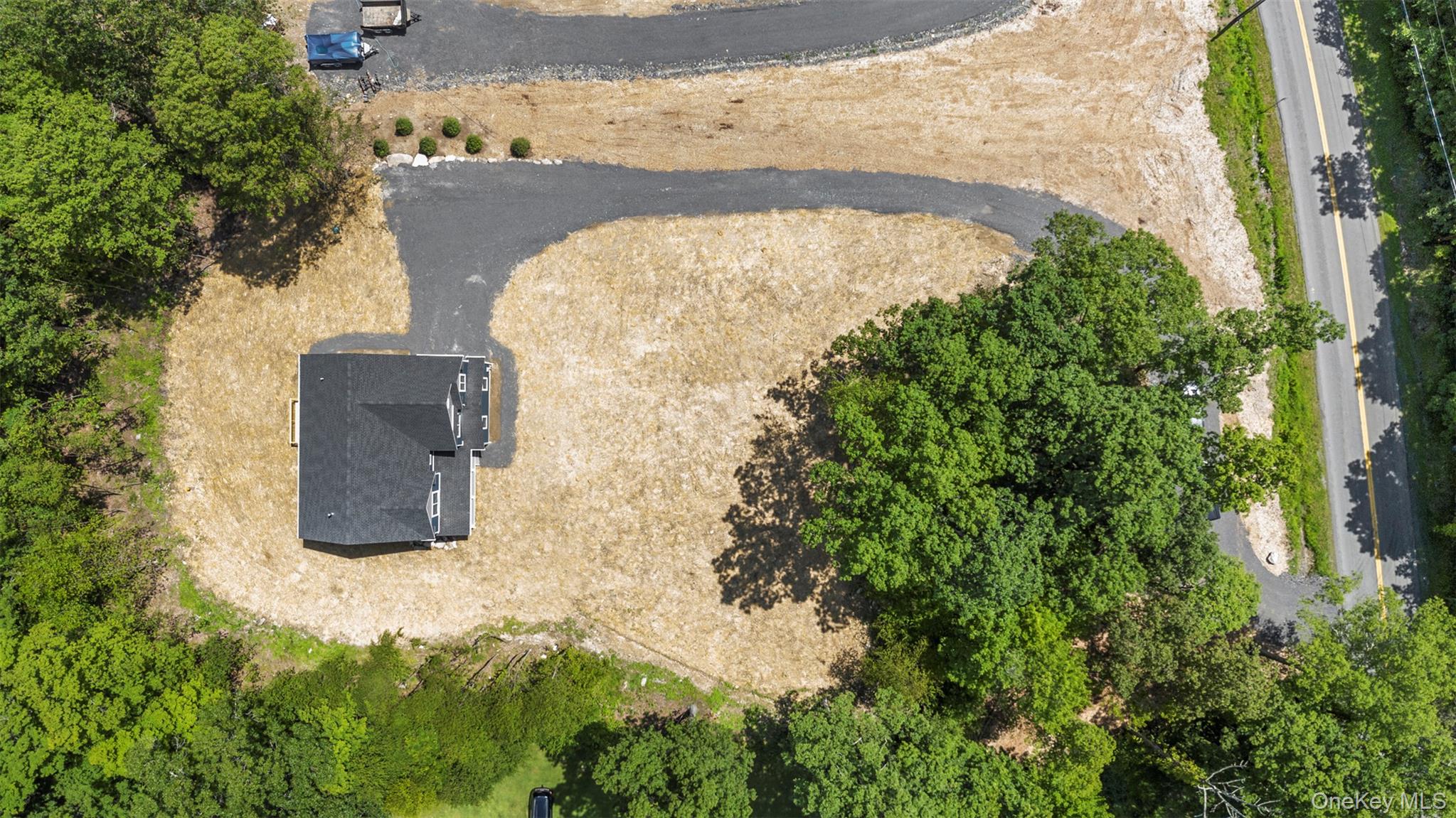 264 Lybolt Road Middletown, NY 10941 - Photo 7 of 45 an aerial view of a house with a yard and large trees