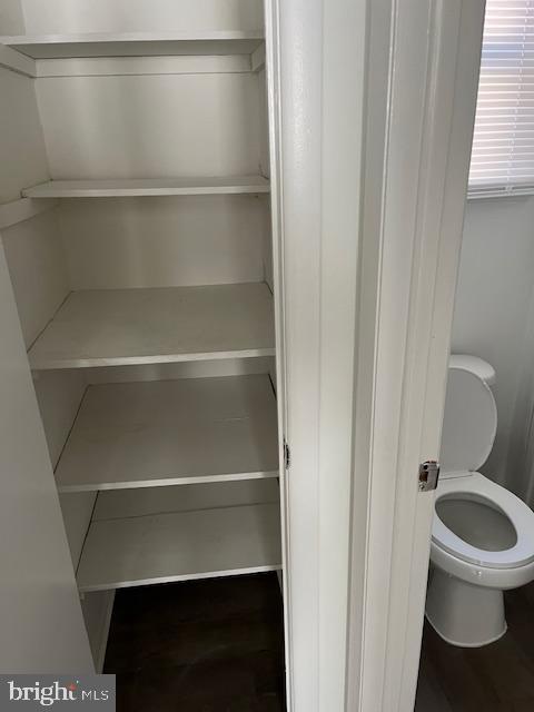 10-3 Florence Tollgate Florence, NJ 08518 - Photo 17 of 17 a bathroom with a toilet and a chair