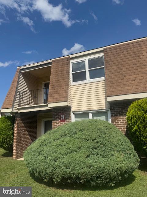 10-3 Florence Tollgate Florence, NJ 08518 - Photo 2 of 17 a view of backyard with small cabin