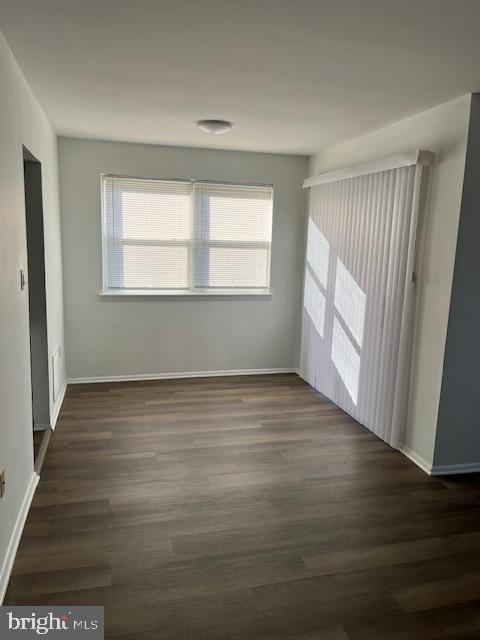 10-3 Florence Tollgate Florence, NJ 08518 - Photo 4 of 17 an empty room with wooden floor and windows