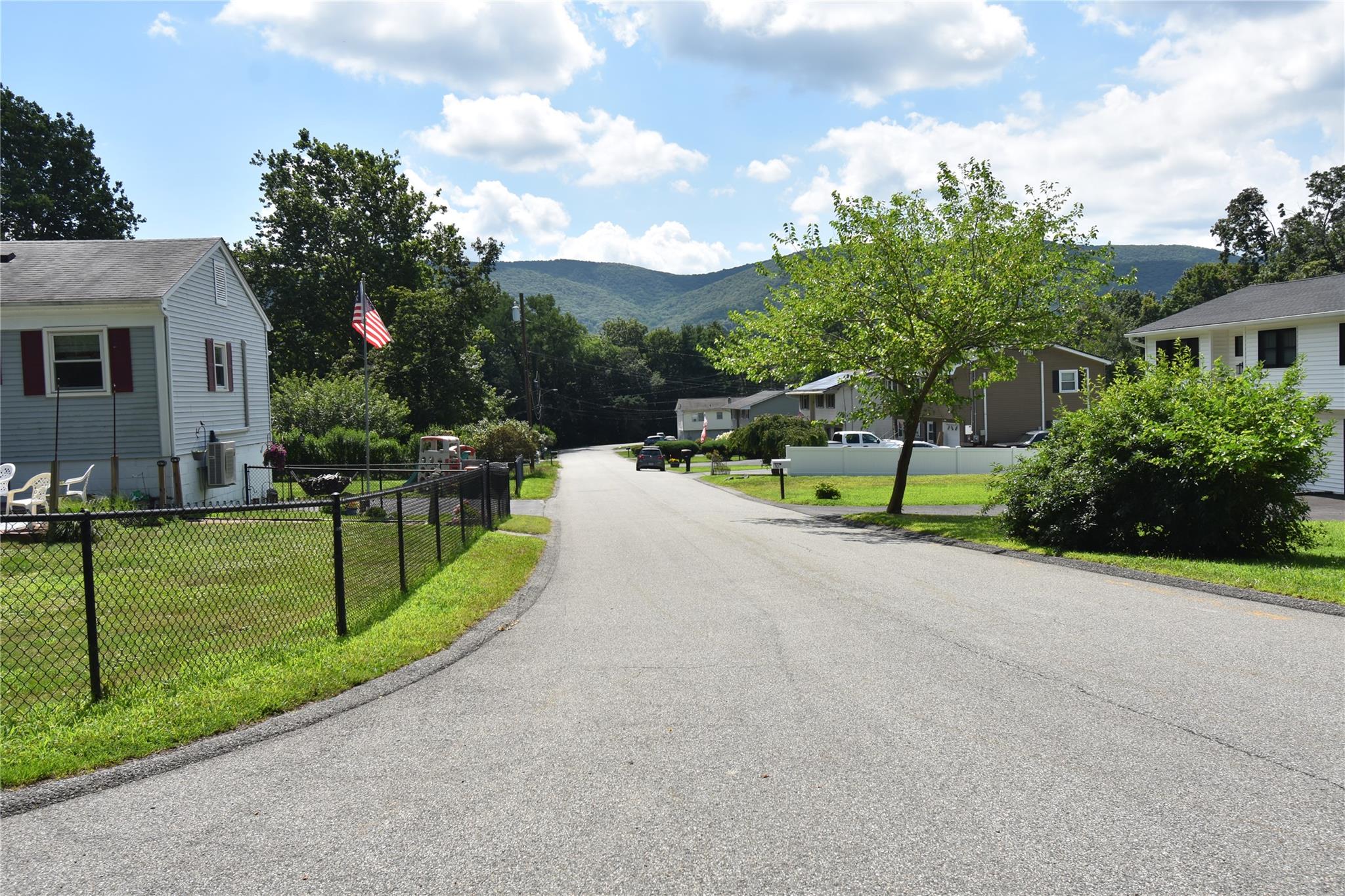 Stewart Avenue Beacon, NY 12508 - Photo 10 of 10 a view of a house with a yard and tree s
