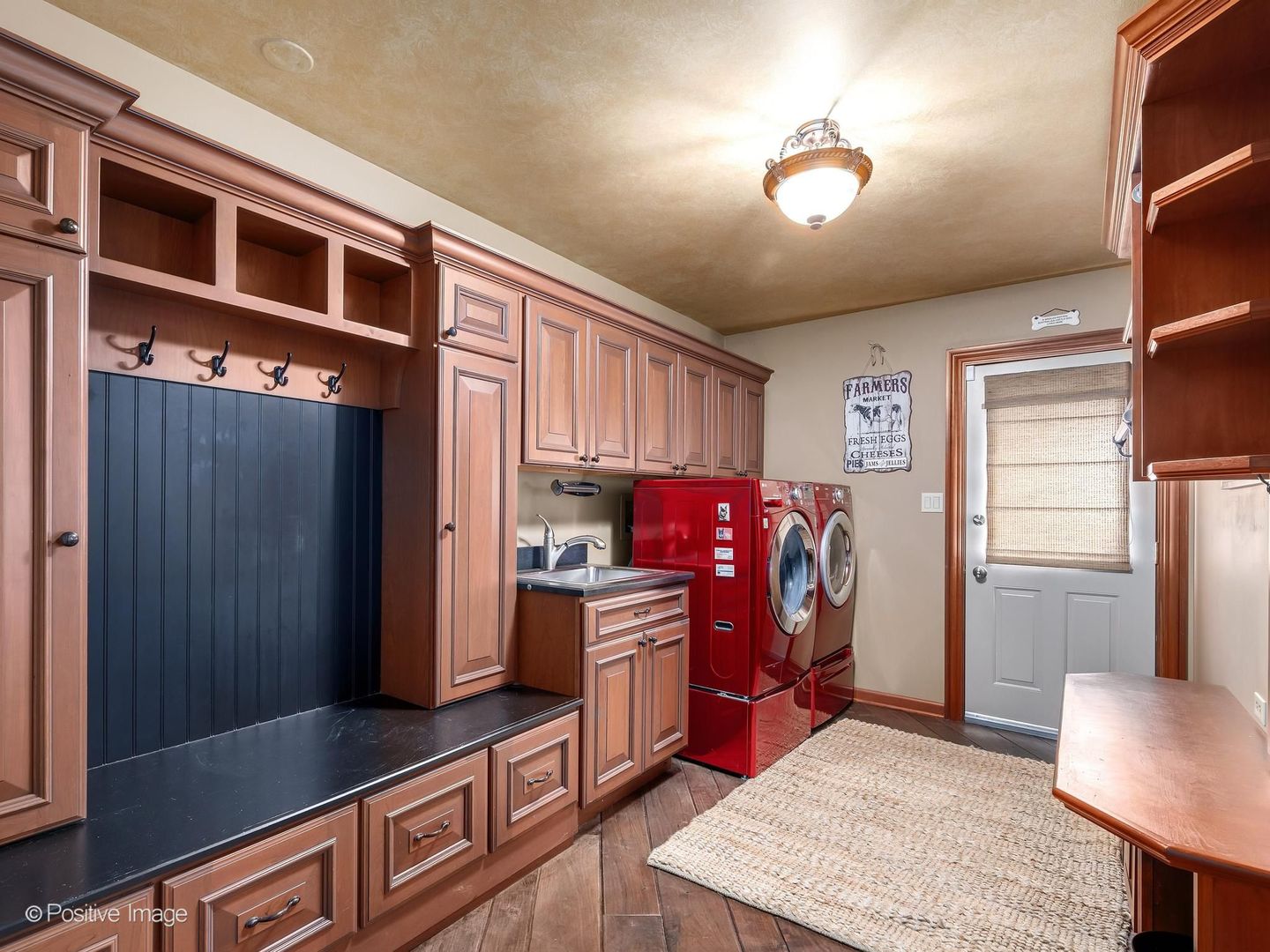 6451 Garfield Ridge Court Burr Ridge, IL 60527 - Photo 16 of 28 a kitchen with stainless steel appliances granite countertop a refrigerator and stove