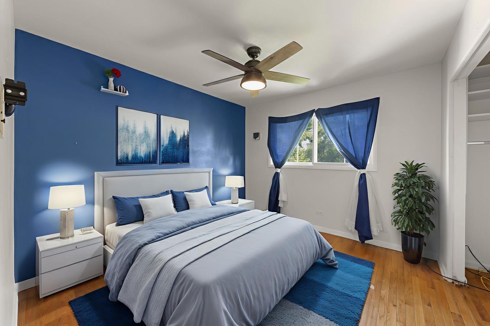 18749 Loomis Avenue Homewood, IL 60430 - Photo 23 of 41 a bedroom with a bed and a chandelier