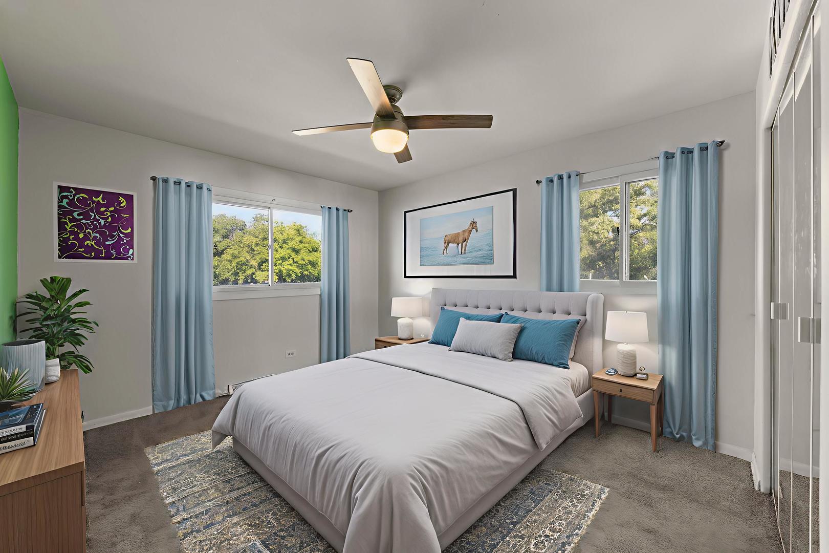 18749 Loomis Avenue Homewood, IL 60430 - Photo 25 of 41 a bedroom with a large bed and a chandelier