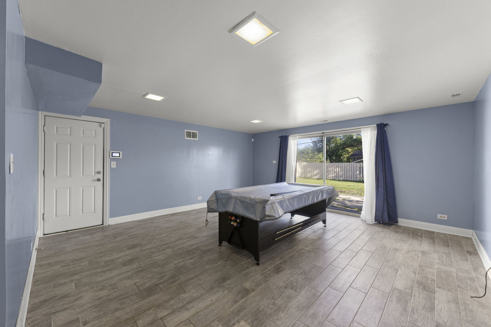 18749 Loomis Avenue Homewood, IL 60430 - Photo 28 of 41 a living room with a bed furniture and a window